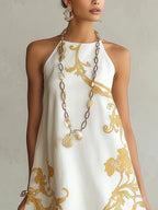 Emilia Vestido Mini de Encaje Blanco y Dorado con Estampado Decorativo