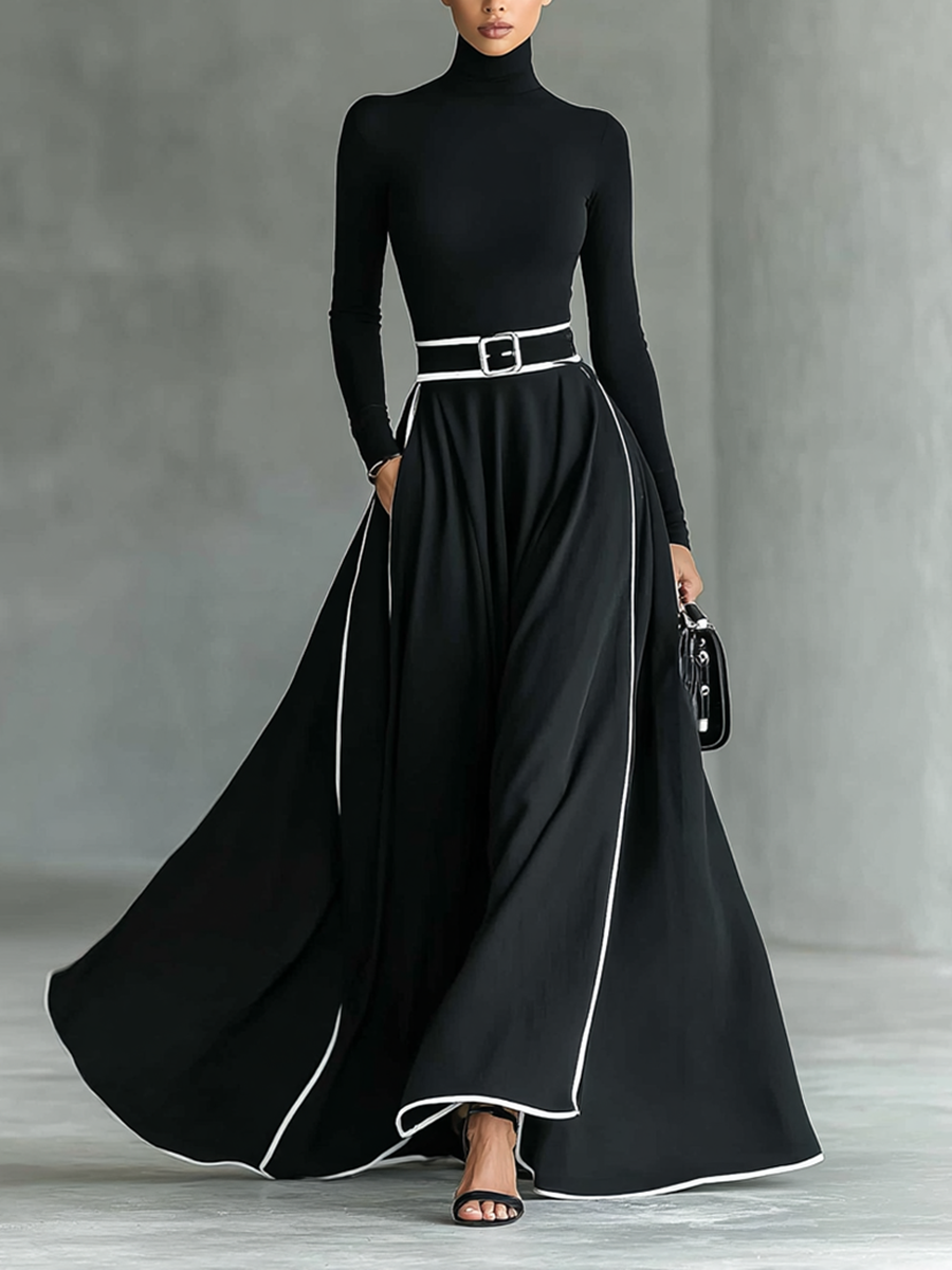 Albarracín – maxivestido negro con costuras blancas y cuello alto