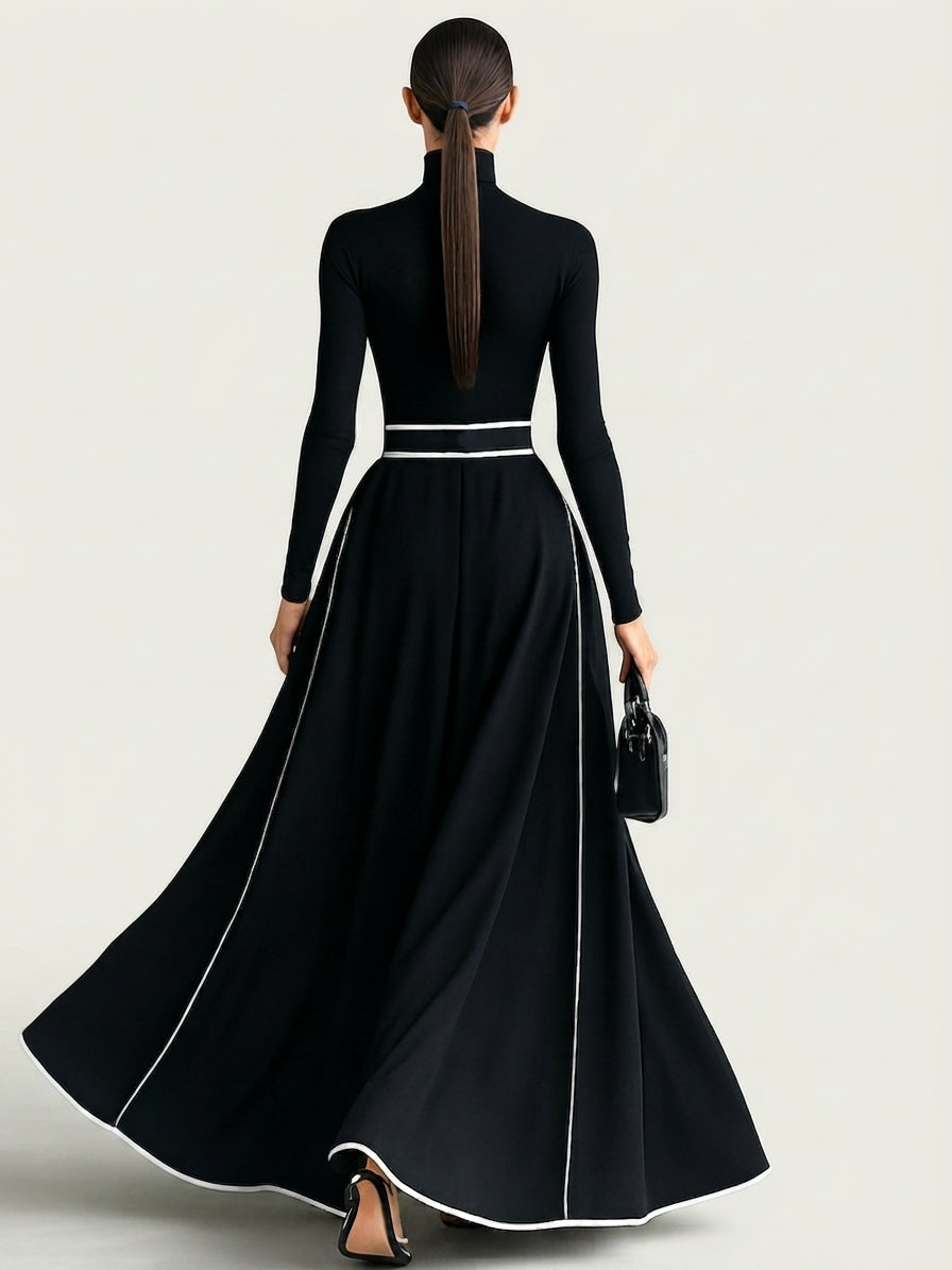 San Sebastian | Vestido Maxi Negro con Costuras Blancas y Cuello Alto