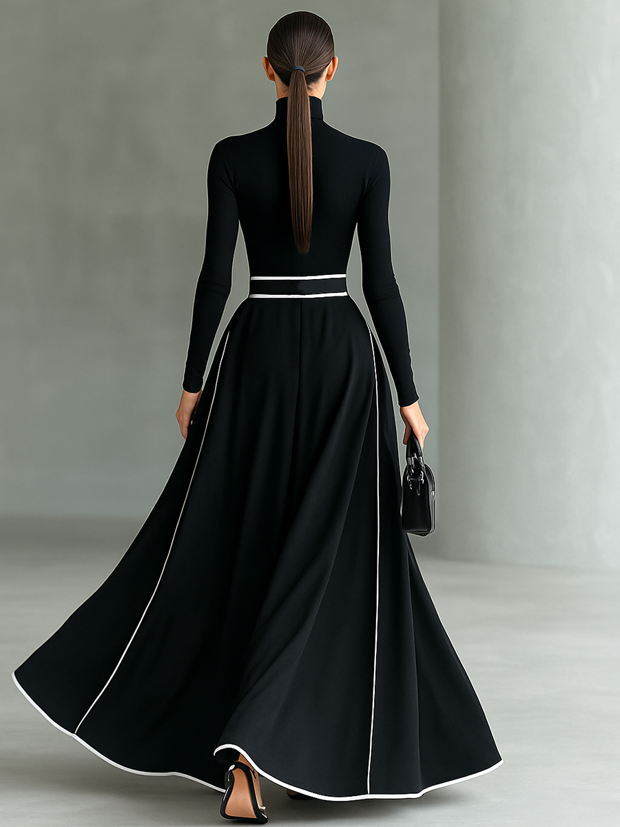 Albarracín – maxivestido negro con costuras blancas y cuello alto